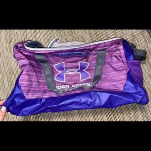 Purple Under Armour gym bag.